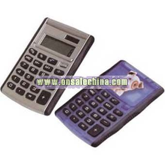 Eight digit flipper calculator with rubber grid and raised soft rubber key