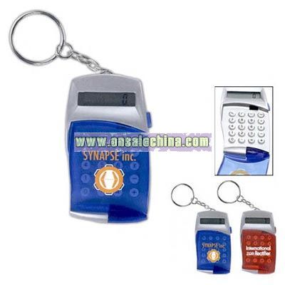 Keychain calculator with hinged cover and push button opening