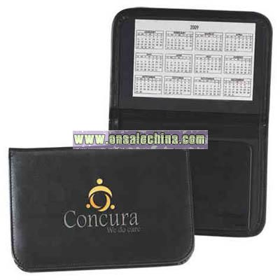 Simulated leather prescription pad holder with calendar card