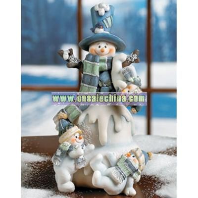Snowman With Three Snow Kids