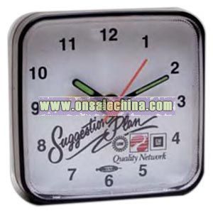 Travel alarm clock with white dial