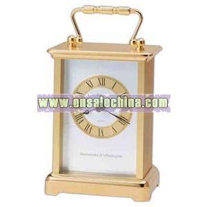 Clock with goldtone case