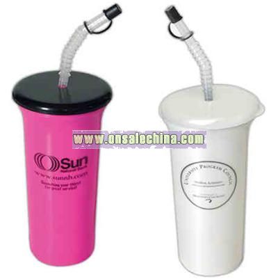 Sports tumbler with black lid and clear flexible straw