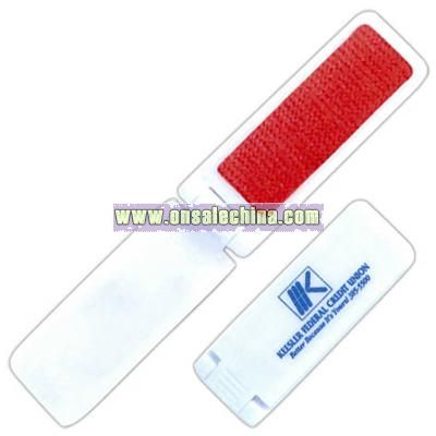 Folding lint brush with shoe horn