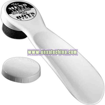 White shoe horn with built in shoe polisher