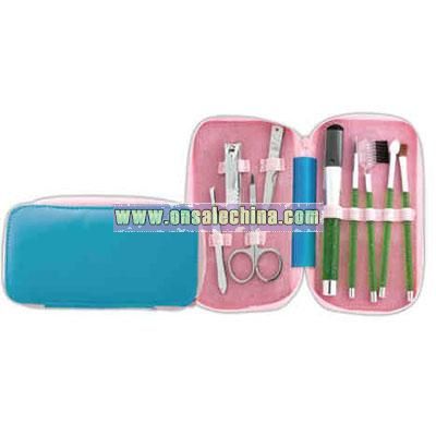 Four piece manicure / pedicure set with 5 piece make-up brushes