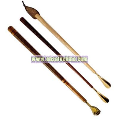 Exotic hardwood back scratcher with solid brass top