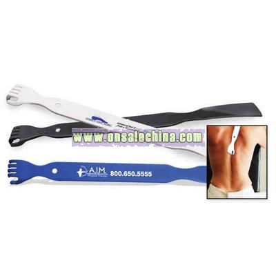 Back scratcher / shoehorn loaded with features