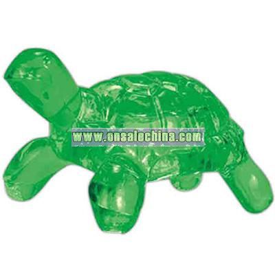 Translucent green turtle shaped massager