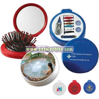 Round shape personal travel kit includes mirror, sewing kit and hairbrush