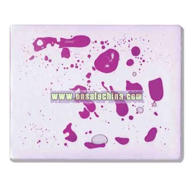 Mouse pad filled with clear and purple liquid