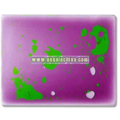 Mouse pad filled with purple and green liquid