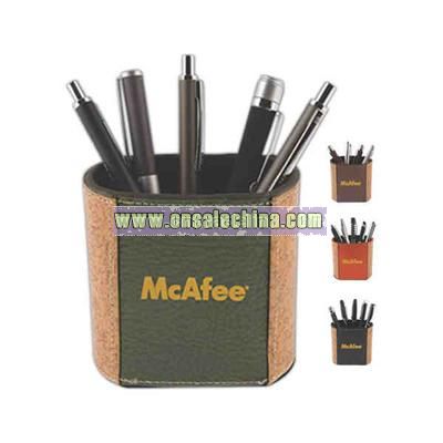Simulated leather pen cup with velveteen base protects surfaces
