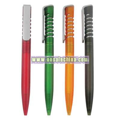 Plastic pen with spring barrel design