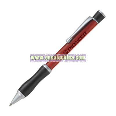 Twist action ball point pen with rubber grip.