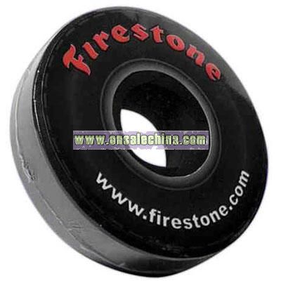 Compressed t-shirt in tire life ring or donut shape