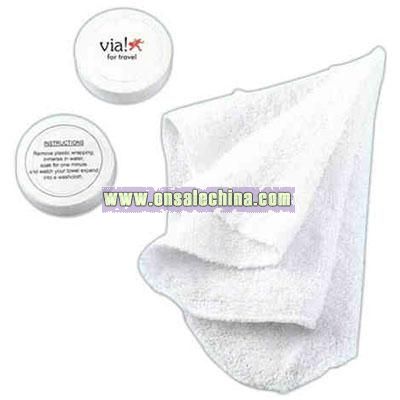 Compressed hand towel or face cloth