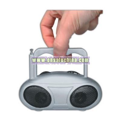 Finger tip AM/FM radio with antenna