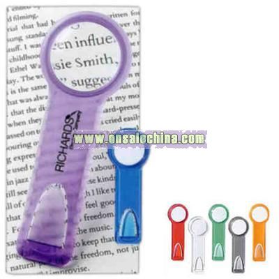 Plastic ruler / bookmark with magnifying glass
