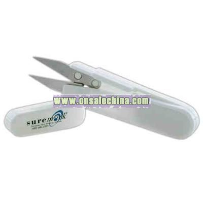 Portable scissors that close into lid