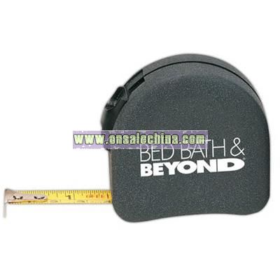 Tape measure with retractable locking feature and belt clip on back