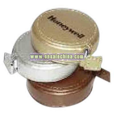 Round metallic leatherette locking tape measure with press-release padded case
