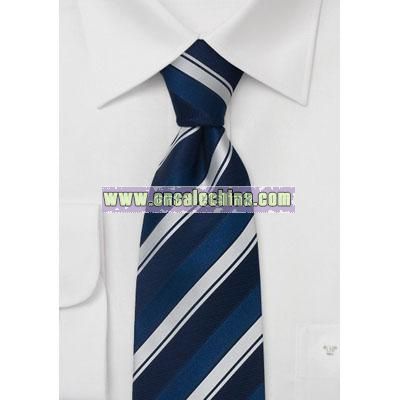Saphire blue silk tie with silver stripes