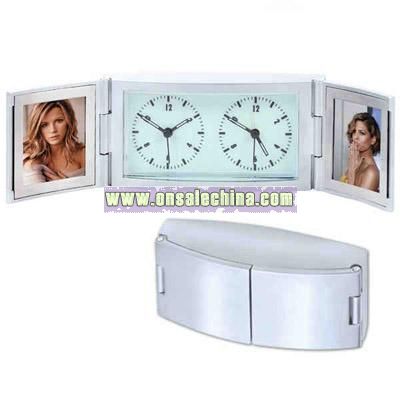 Matte silver dual time alarm clock with glow in the dark dial and double frame.