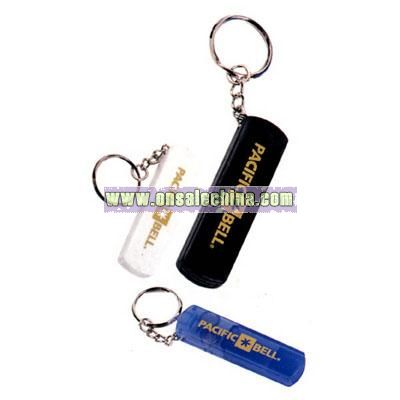 Key holder with whistle and light