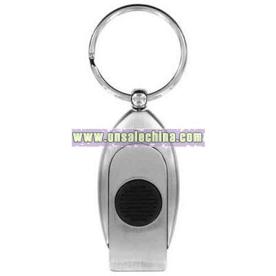 Key tag with red light and whistle shape