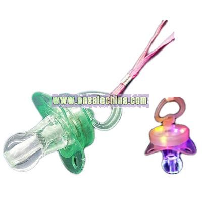 Flashing whistle pacifier