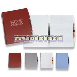 ruled notebook and pen