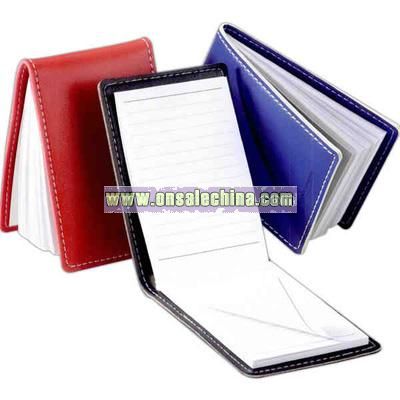 Vinyl refillable jotter with white stitching.